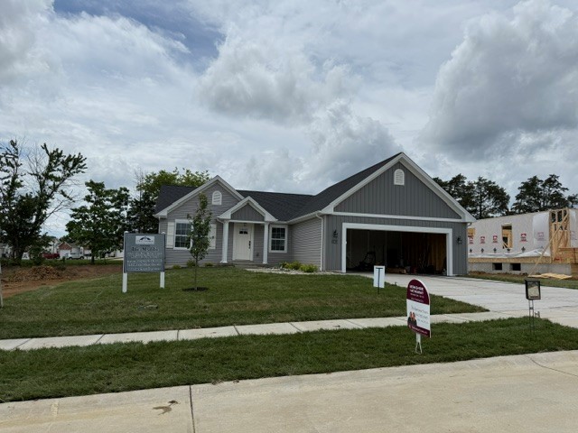 Gray house with white trim
